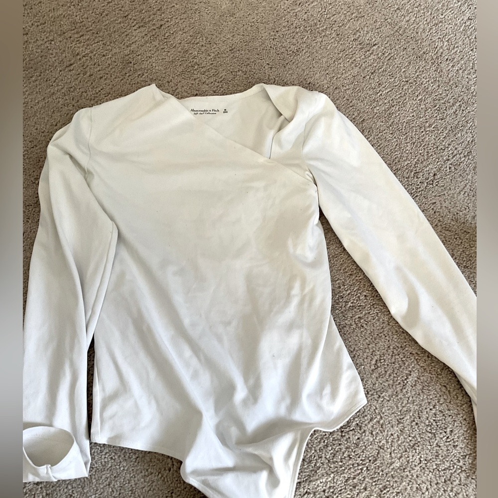 Abercrombie and fitch white asymmetrical body suit size medium